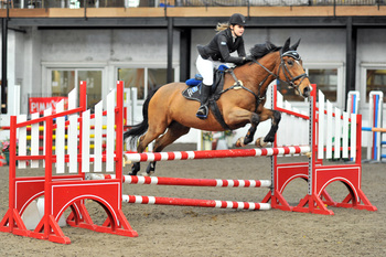 Abbey Russell books her place in the Dodson & Horrell 0.85m National Amateur Championship Final